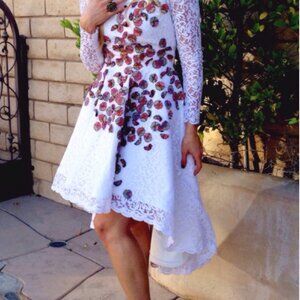Asymmetrical dress with floral and lace